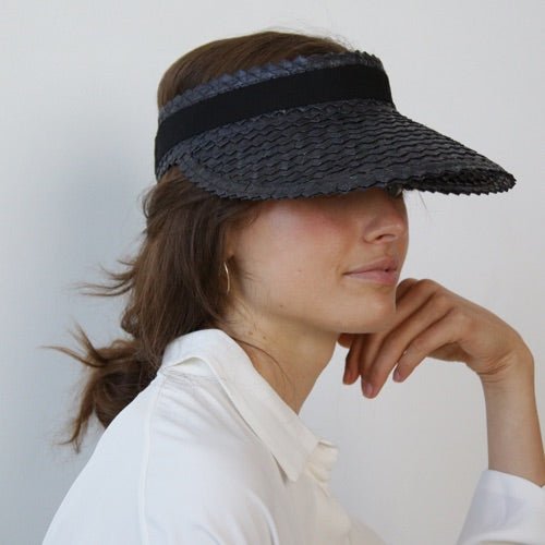 White straw hat with large crown and medium brim 