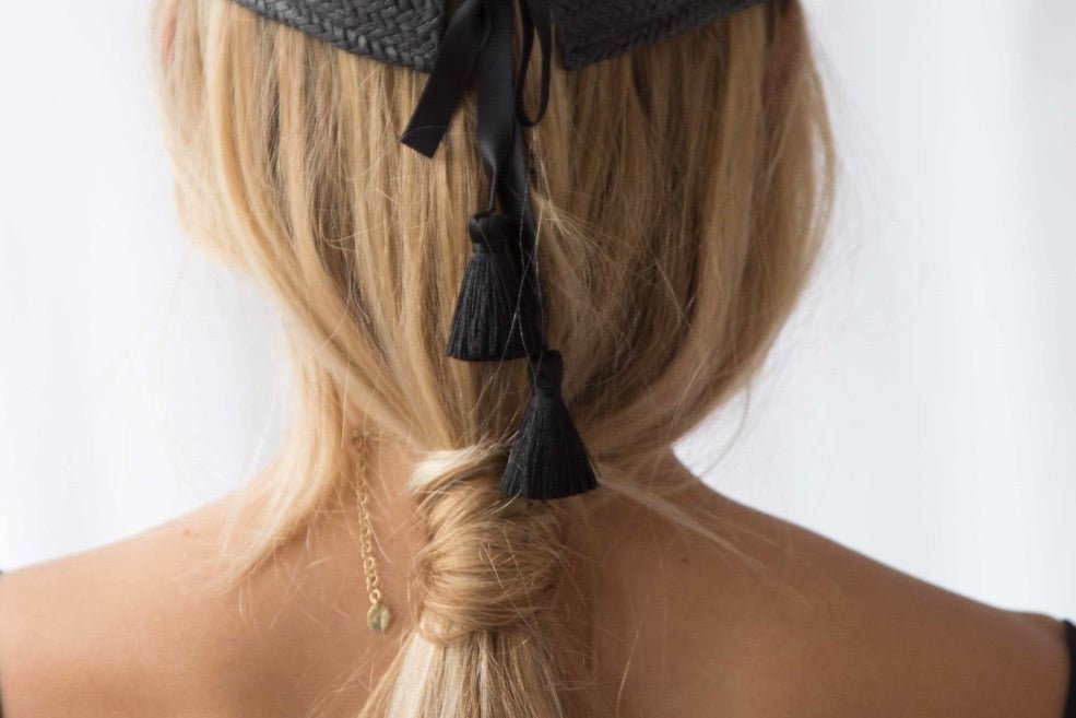 black handwoven straw cap