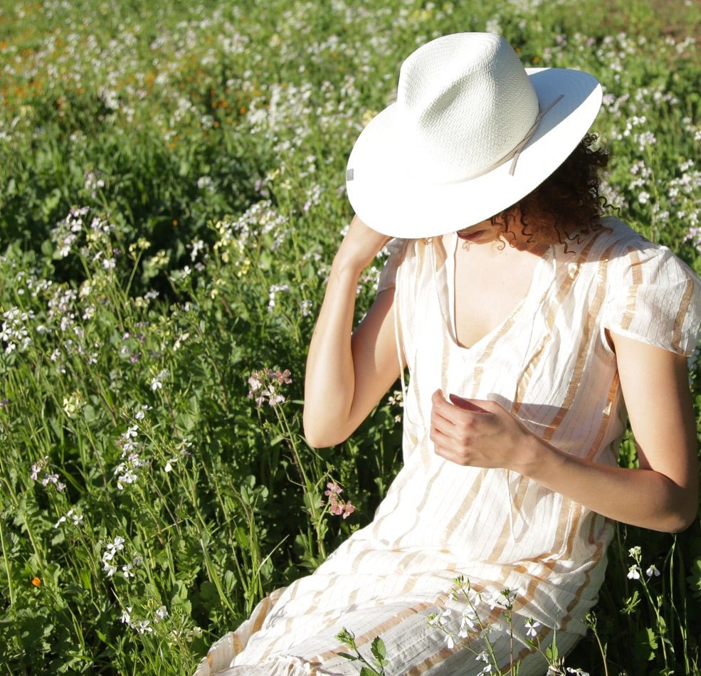 Everyday packable ivory hand-made straw hat with Leather cord and metal accent 