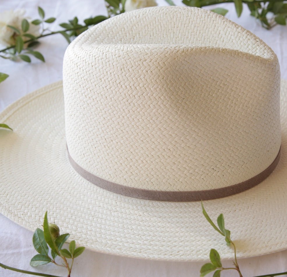 A close-up of a modern cream straw hats weave 