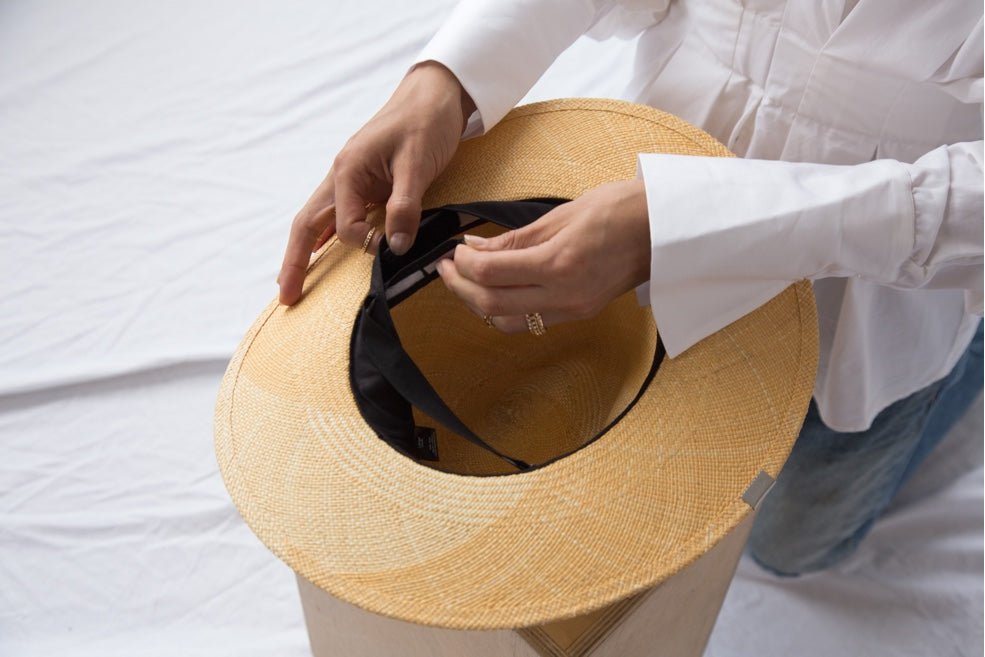 Black inner liner of a modern straw hat 