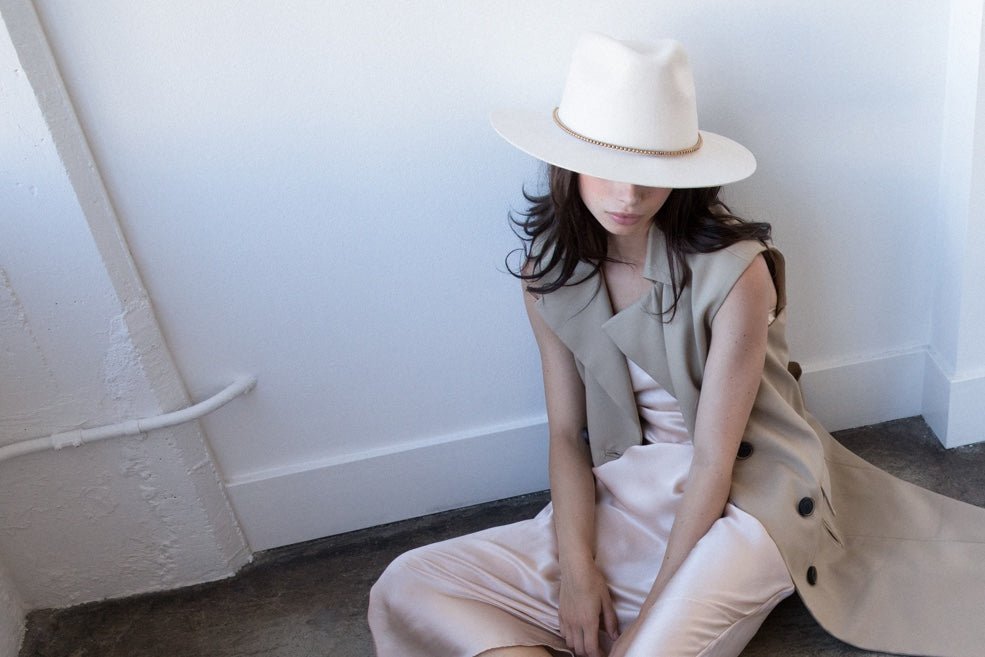 White straw hat with large crown and medium brim 